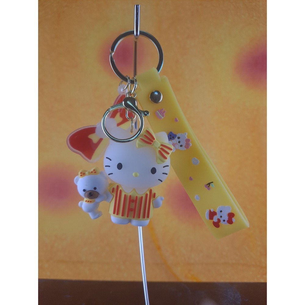 Hello Kitty In Yellow And‎ Red Striped Costume Rubber & Metal Keychain